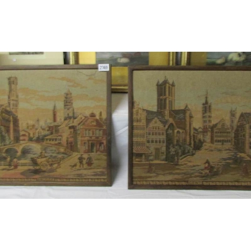 2369 - 2 framed tapestries of churches.