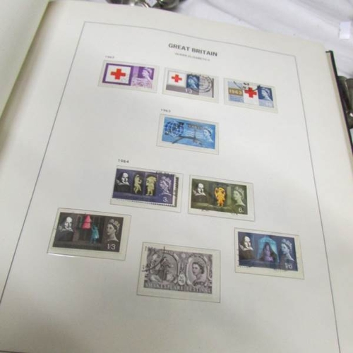 2433 - 3 stock books / albums of British stamps mostly Elizabeth II but also including other monarchs.