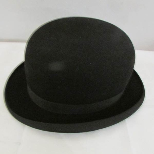 2528 - A leather cased bowler hat marked Christy's London.