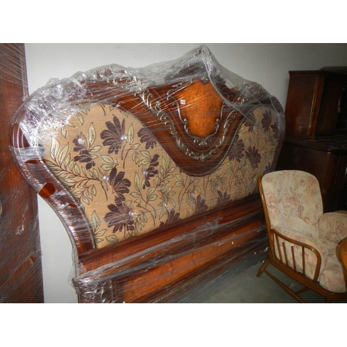 2704 - A superb quality gilded bed surround with upholstered headboard.

This is a new and never used but i... 