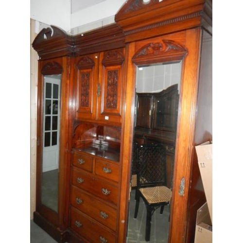 2708 - A Victorian combination wardrobe with centre drawer and cupboard.