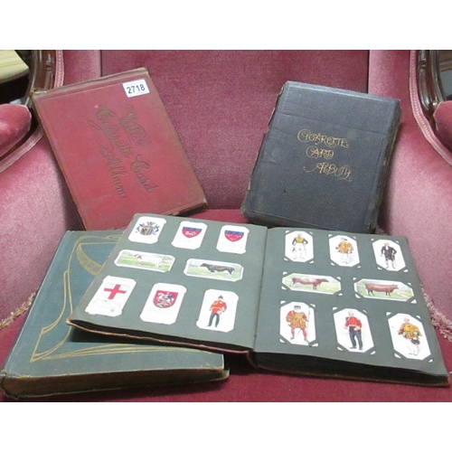 2718 - 3 albums of old cigarette cards and an album of Bible Lesson Pictures