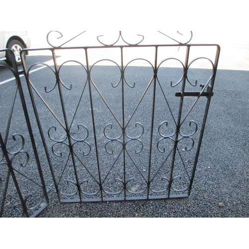 1524 - A pair of ornamental metal gates