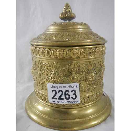 2263 - An old brass tobbaco pot with lead lining and internal lid.