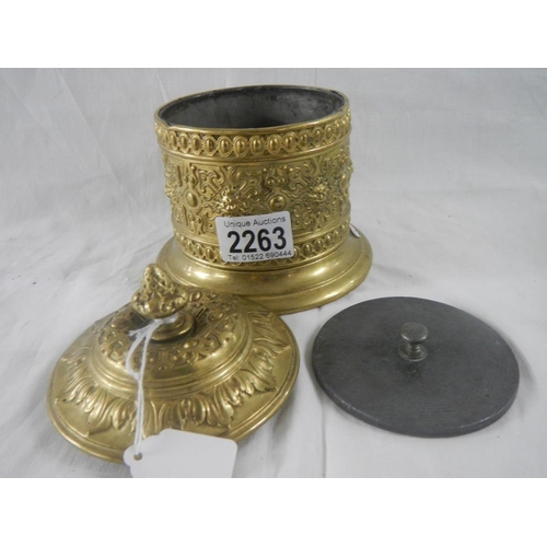 2263 - An old brass tobbaco pot with lead lining and internal lid.