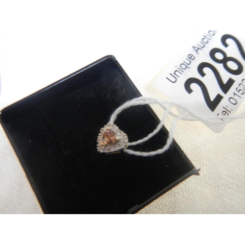 2282 - An 18ct white gold heart pendant.