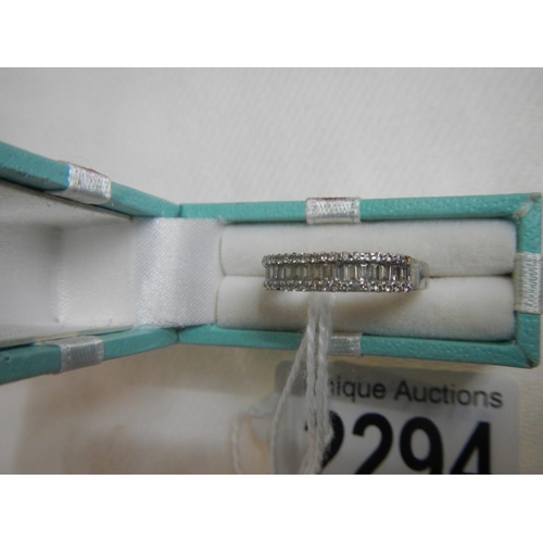 2294 - An 18ct white gold baguette and brilliant diamond ring.