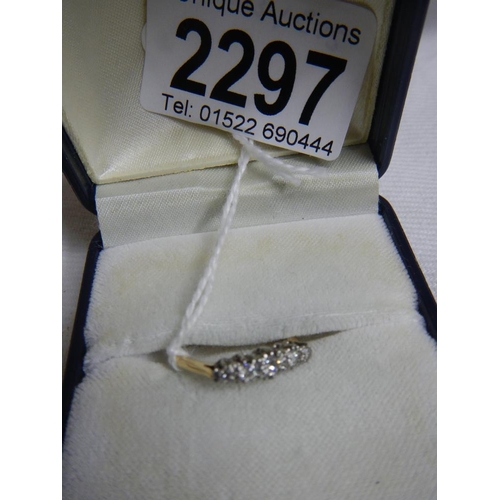 2297 - An 18ct yellow gold 5 stone diamond ring.