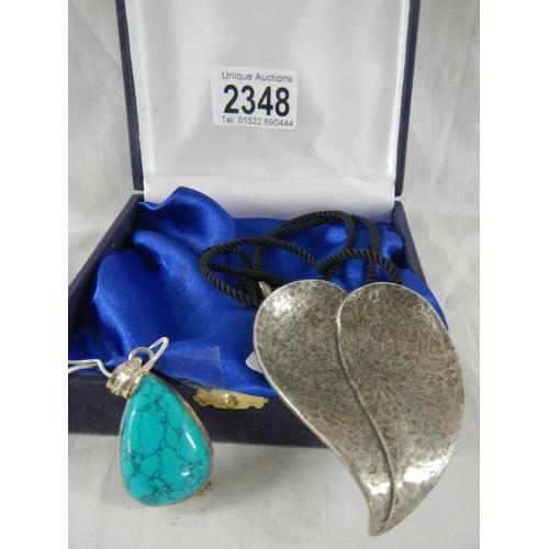 2348 - A Delphone Norden designer necklace and a silver necklace.