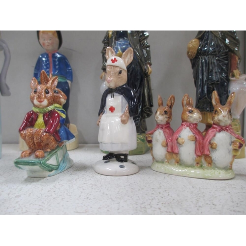 2355 - A collection of figurines including Lladro, Bunnykins, Beatrix Potter etc