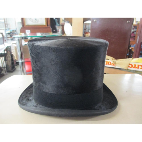 2525 - A leather cased silk top hat marked 'Lincoln', Bennett & Co., Sackville Street, Picadilly, London. H... 