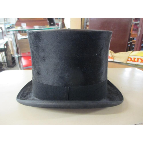 2525 - A leather cased silk top hat marked 'Lincoln', Bennett & Co., Sackville Street, Picadilly, London. H... 