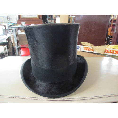 2525 - A leather cased silk top hat marked 'Lincoln', Bennett & Co., Sackville Street, Picadilly, London. H... 