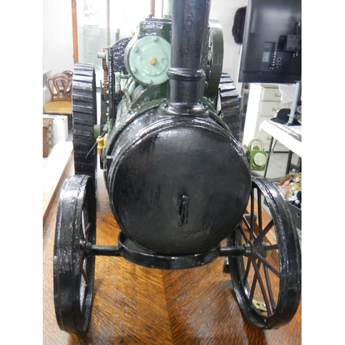 2515 - A handbuilt clockwork traction engine in custom built case on stand.  Cabinet is 78cm long x 46.5cm ... 