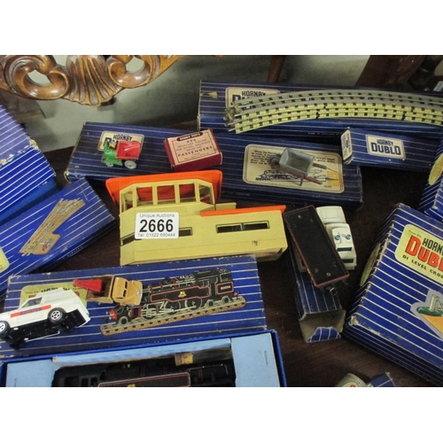 2666 - A quantity of boxed Hornby Dublo railway items including locomotive, rolling stock etc.,