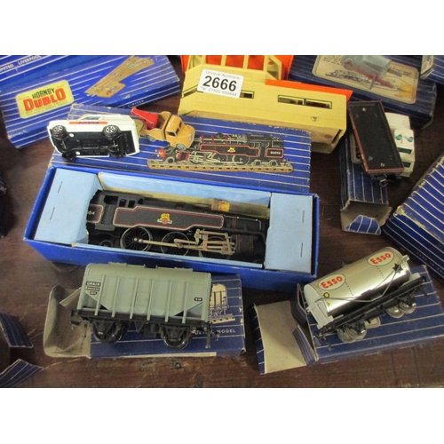 2666 - A quantity of boxed Hornby Dublo railway items including locomotive, rolling stock etc.,