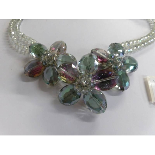 504 - A lovely double row multi coloured crystal necklace.