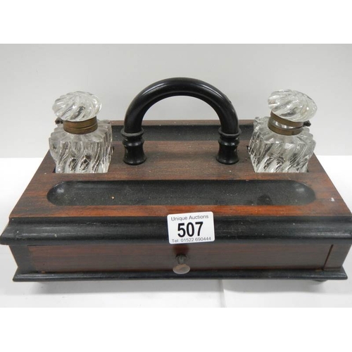 507 - A good early 20th century desk stand with 2 inkwells and single drawer to base.