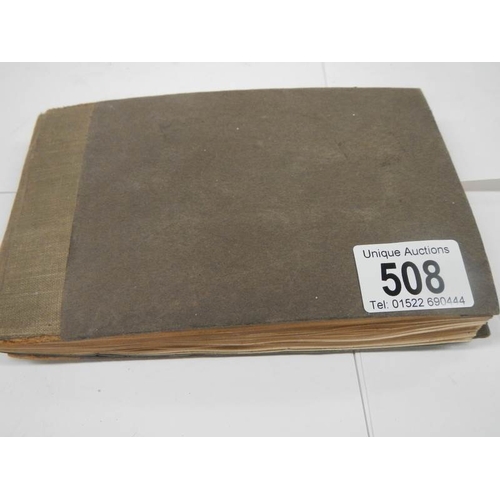 508 - An old autograph book containing aircraft pictures and Kensitas cigarette cards, approximately 28 pa... 