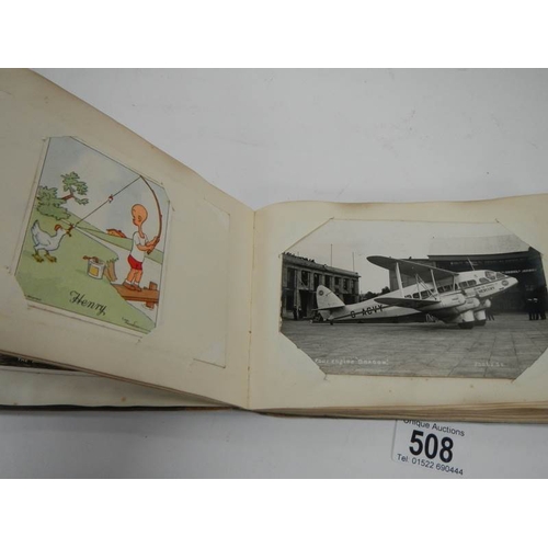 508 - An old autograph book containing aircraft pictures and Kensitas cigarette cards, approximately 28 pa... 