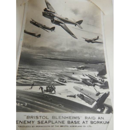 508 - An old autograph book containing aircraft pictures and Kensitas cigarette cards, approximately 28 pa... 