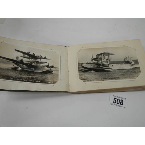 508 - An old autograph book containing aircraft pictures and Kensitas cigarette cards, approximately 28 pa... 