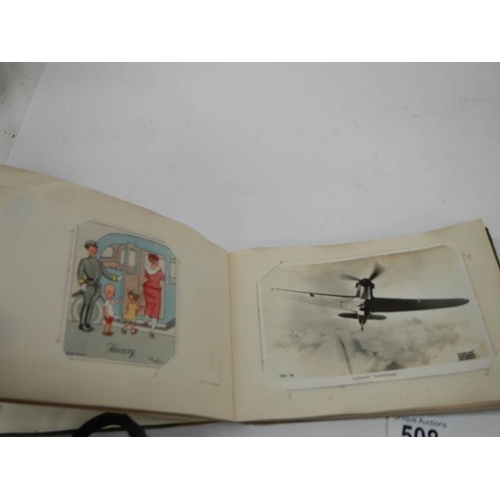 508 - An old autograph book containing aircraft pictures and Kensitas cigarette cards, approximately 28 pa... 