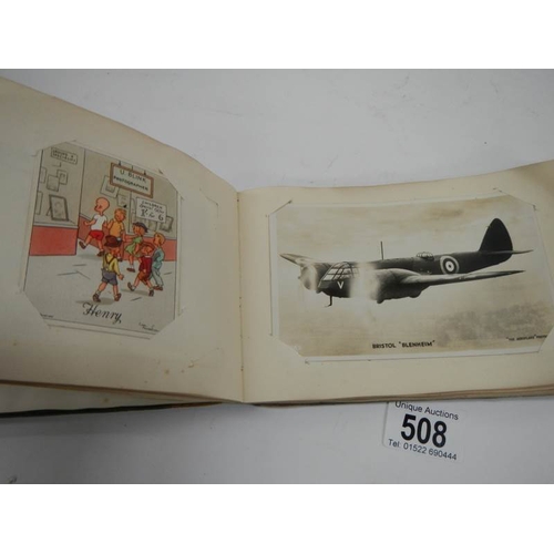 508 - An old autograph book containing aircraft pictures and Kensitas cigarette cards, approximately 28 pa... 