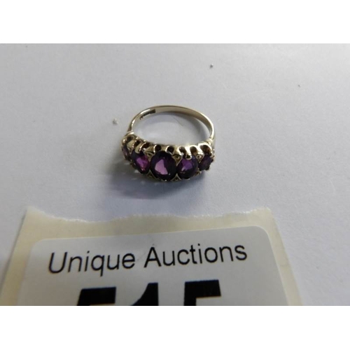 515 - A mid 20th century five stone amethyst set ring in 9ct gold, size M.