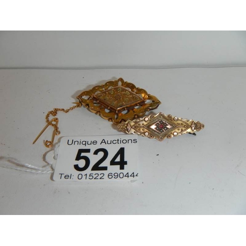 524 - 2 9ct gold brooches.