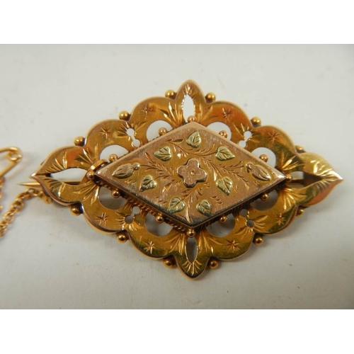 524 - 2 9ct gold brooches.