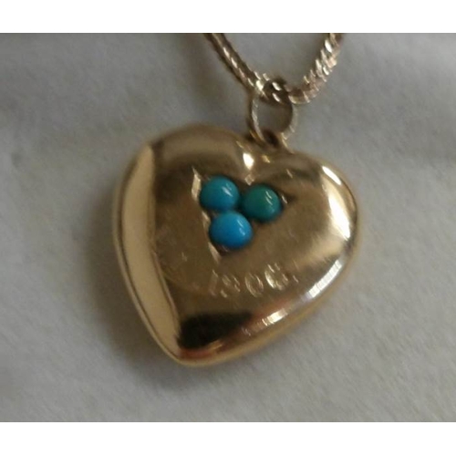 526 - An early 20th century sweetheart locket set with turquoises, locket back dated 1906 in 9ct gold with... 