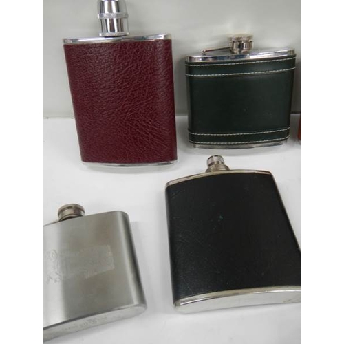 529 - 9 20th century hip flasks (6 leather coloured, 3 not)