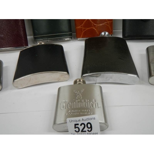 529 - 9 20th century hip flasks (6 leather coloured, 3 not)