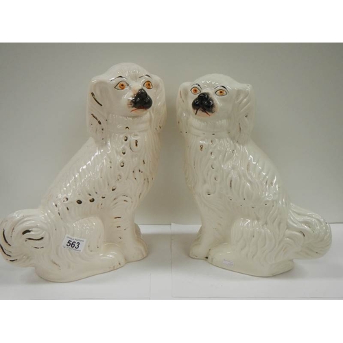 563 - A pair of early 20th century Staffordshire dogs, 14'' tall (one has crack as shown in image, other i... 