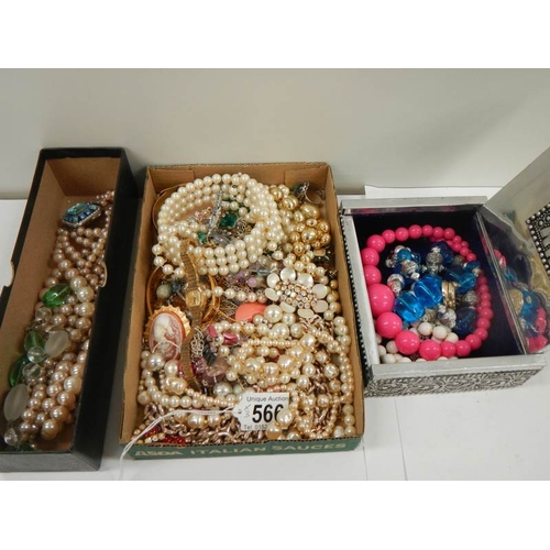 566 - 2 trays of costume jewellery, all good items including silvered box.