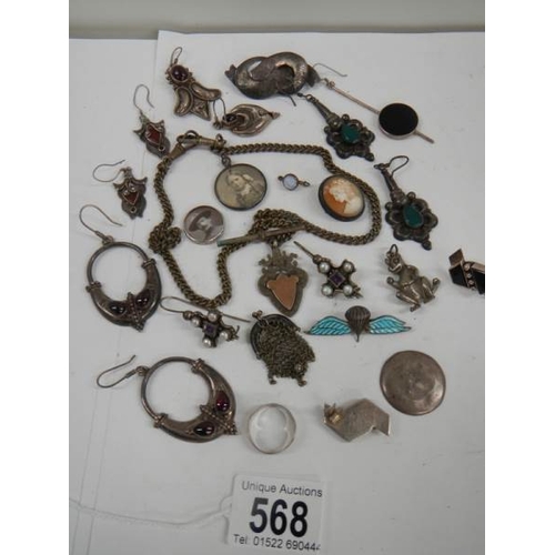 568 - A tray of jewellery including some silver, fob, earrings etc.