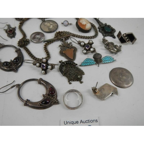 568 - A tray of jewellery including some silver, fob, earrings etc.