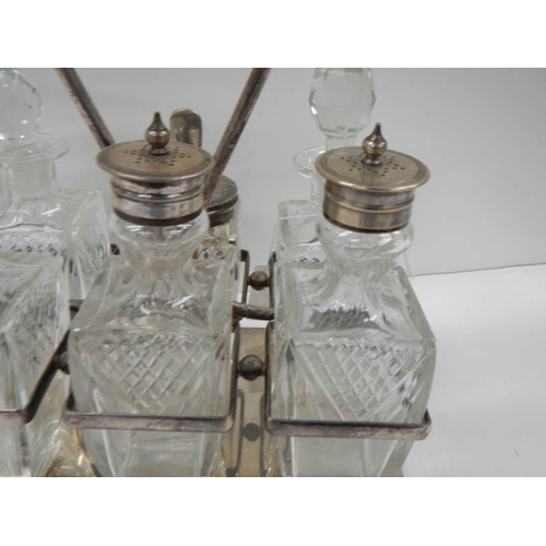 573 - A good 6 bottle cruet in good condition.