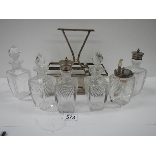 573 - A good 6 bottle cruet in good condition.