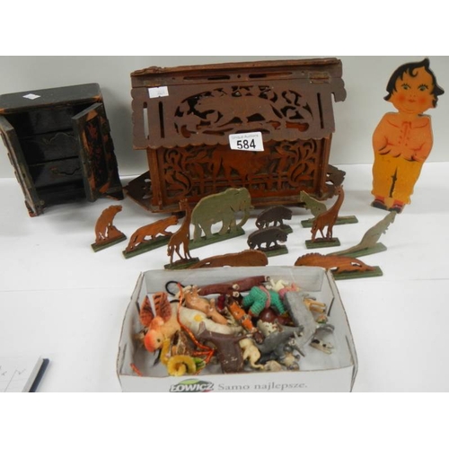 584 - An old toy Noah's ark with wooden animals, miniature chest etc.,