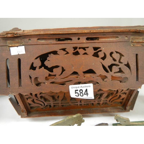 584 - An old toy Noah's ark with wooden animals, miniature chest etc.,