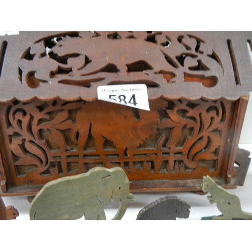 584 - An old toy Noah's ark with wooden animals, miniature chest etc.,