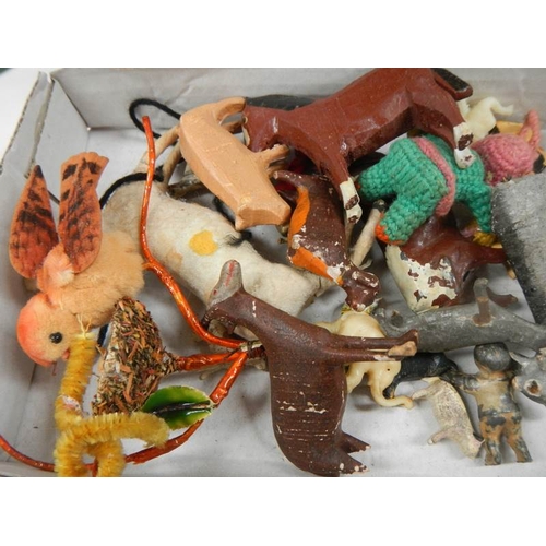 584 - An old toy Noah's ark with wooden animals, miniature chest etc.,