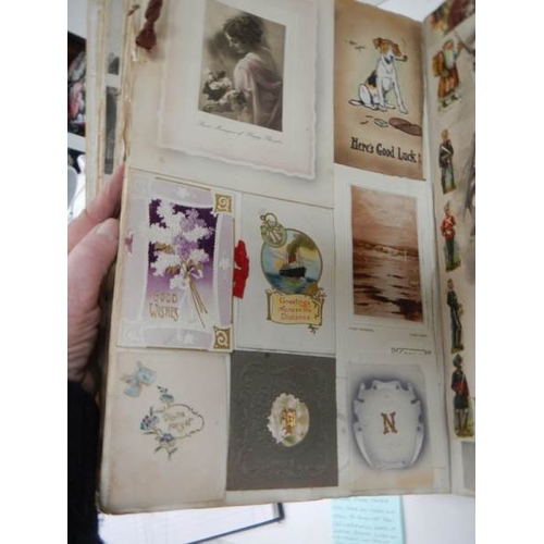 588 - A large and voluminous Victorian and Edwardian Album containing postcards,cigarette cards,scraps and... 