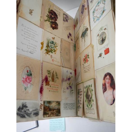 588 - A large and voluminous Victorian and Edwardian Album containing postcards,cigarette cards,scraps and... 