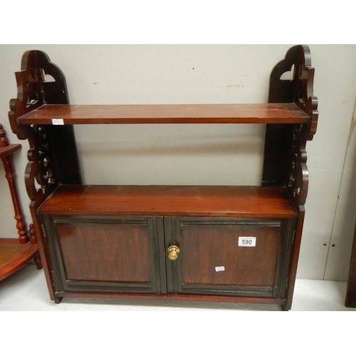 590 - A good mahogany 2 door wall hanging cabinet in good condition.