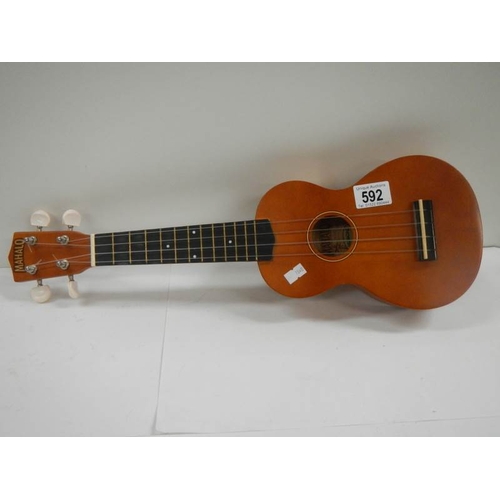 592 - A small modern Makalo 4 string ukelele.