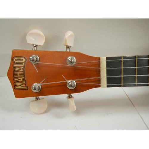 592 - A small modern Makalo 4 string ukelele.