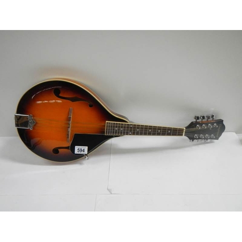 594 - An 8 string Tanglewood teardrop mandolin.